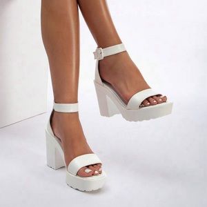 White platform heels with straps! So comfortable!
